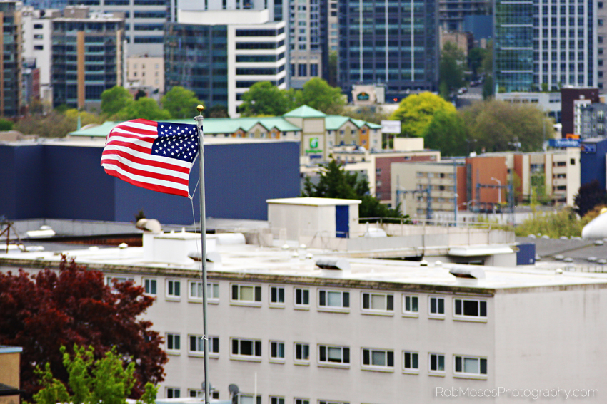 USA famous American Flag wind Seattle Washington America buildings city urban zoom - Rob Moses Photography