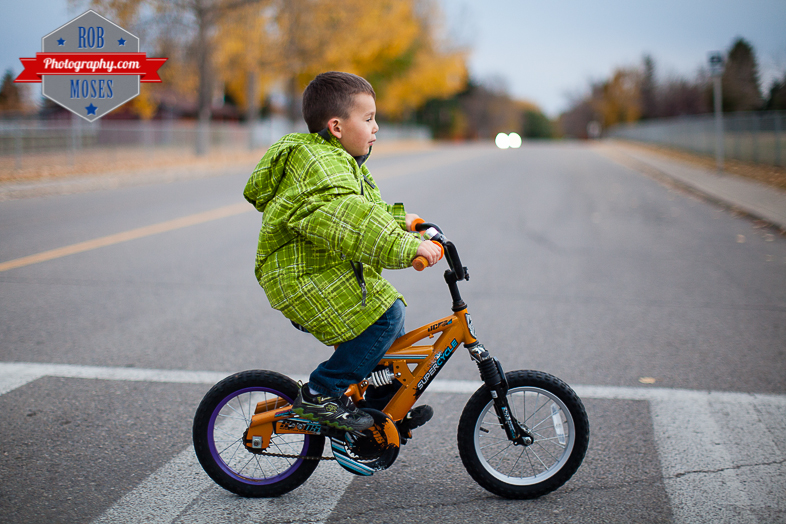 2 Kids kid child children bike ride fun bokeh evening night Canon 50L - Rob Moses Photography