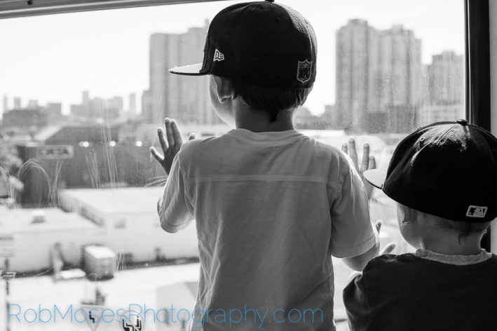 3 boys on train subway - City kid kids yyc urban children city life - Rob Moses Photography