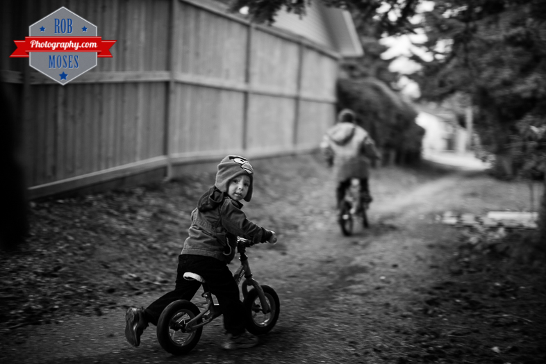3 Kids kid child children bike ride fun bokeh evening night Canon 50L - Rob Moses Photography