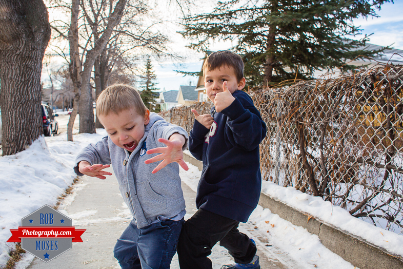 Children boys kids fun Calgary Winter Bridgeland yyc excited fun jumping running yahoo - Rob Moses Photography - Family-1
