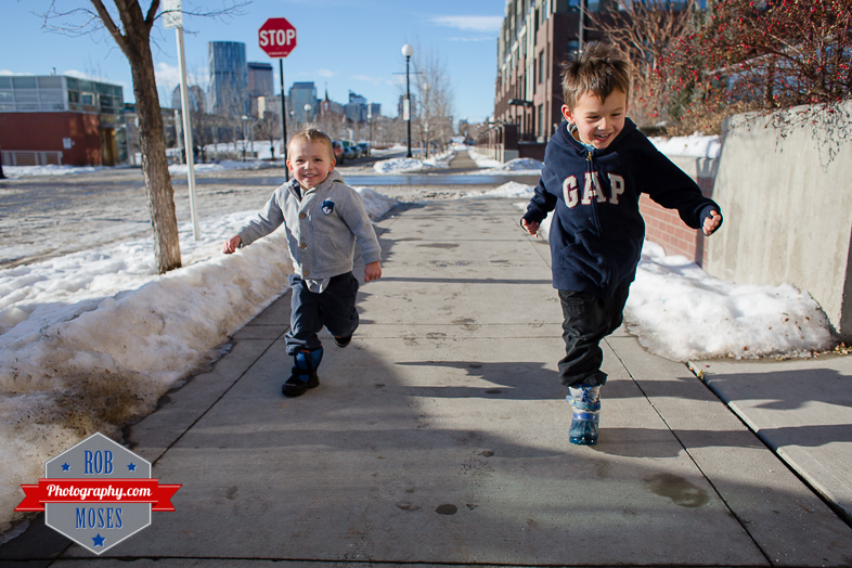 Children boys kids fun Calgary Winter Bridgeland yyc excited fun jumping running yahoo - Rob Moses Photography - Family-15