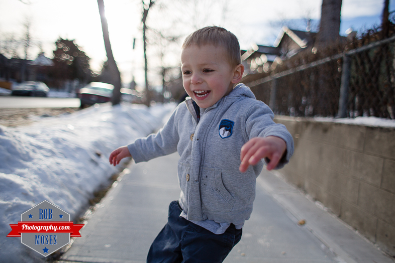 Children boys kids fun Calgary Winter Bridgeland yyc excited fun jumping running yahoo - Rob Moses Photography - Family-4