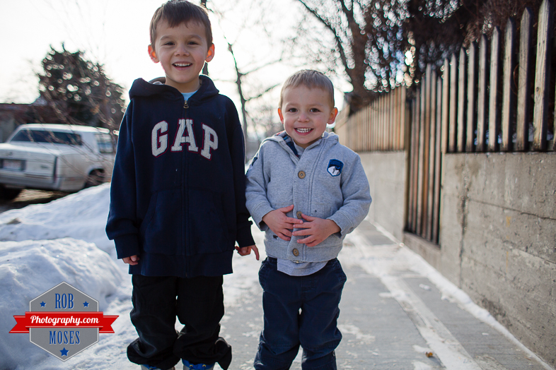 Children boys kids fun Calgary Winter Bridgeland yyc excited fun jumping running yahoo - Rob Moses Photography - Family-5