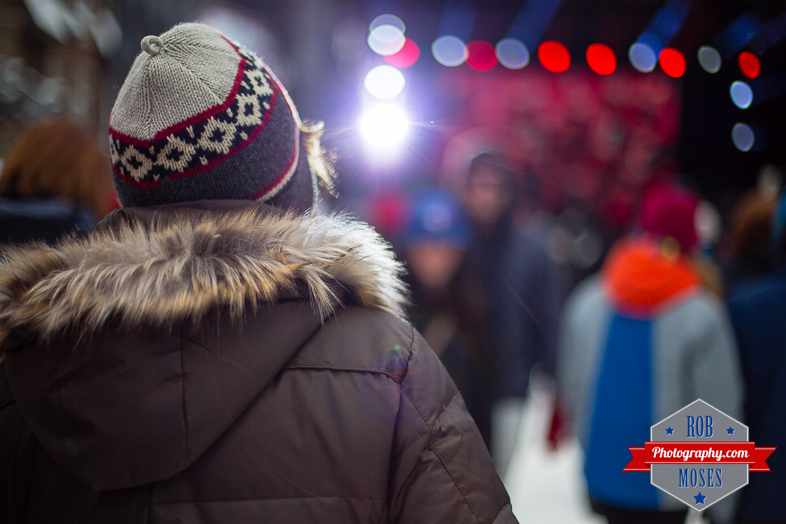 Look Front Stage toque hat fur cote jacket rim light bokeh blur back light flare street - Rob Moses Photography - Calgary Vancouver Seattle Photographer - Famous 50mm Lens
