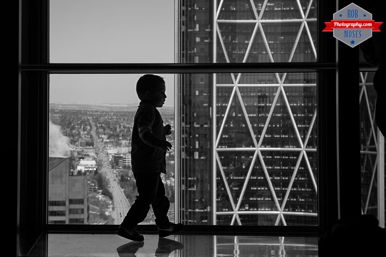 Child Boy Son silhouette building Skyscraper bow Calgary tower yyc - Rob Moses Photography - Native American Alaskan Famous Tlingit - Seattle Top Vancouver Photographer Popular Photographers