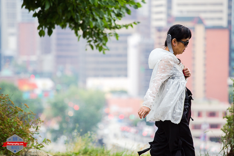 Woman Girl walking YYC urban city bokeh street - Rob Moses Photography - Vancouver Seattle Calgary Photographer Photographer Native American Famous Tlingit Ojibawa Top Popular Best Canadian Lifestyle-5