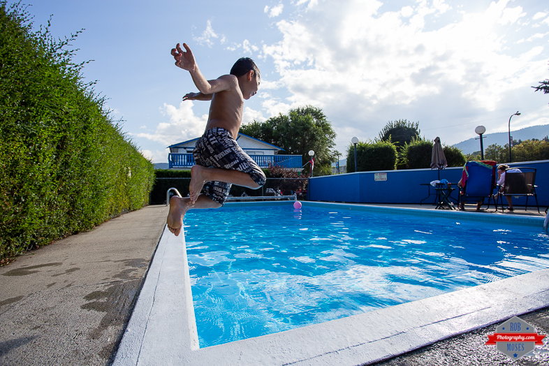 3 Boy Child Kid Son Joshua Jumping Pool Penticton BC British Columba Fun jump - Rob Moses Photography - Vancouver Seattle Calgary Photographer Photographer Native American Famous Tlingit Ojibawa Top Popular Best Canadian Lifestyle