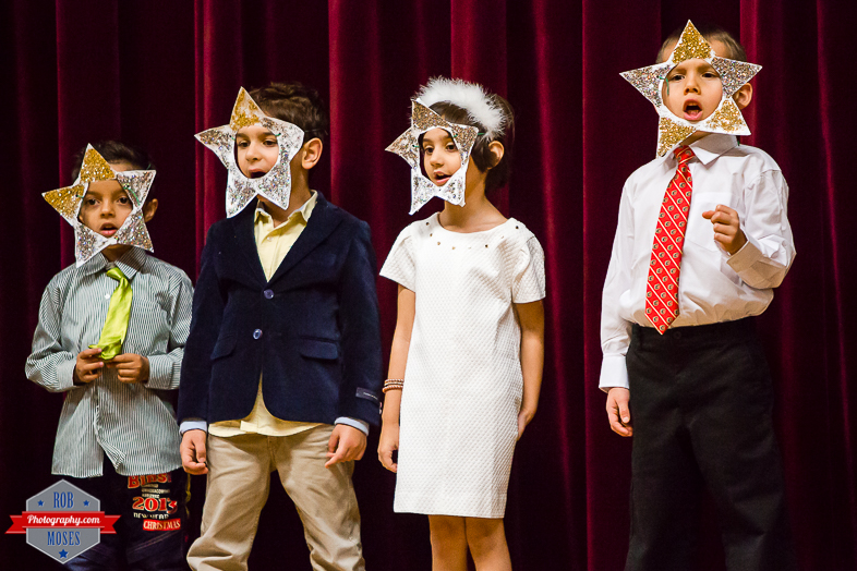 2 Child kid Christmas concert Flames tie cute - Rob Moses Photography - Calgary Photographer Photographers Native American Famous un celebrity Tlingit Ojibawa Top Popular Best Good Canadian