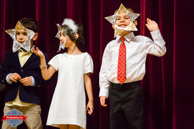 3- Child kid Christmas concert Flames tie cute - Rob Moses Photography - Calgary Photographer Photographers Native American Famous un celebrity Tlingit Ojibawa Top Popular Best Good Canadian