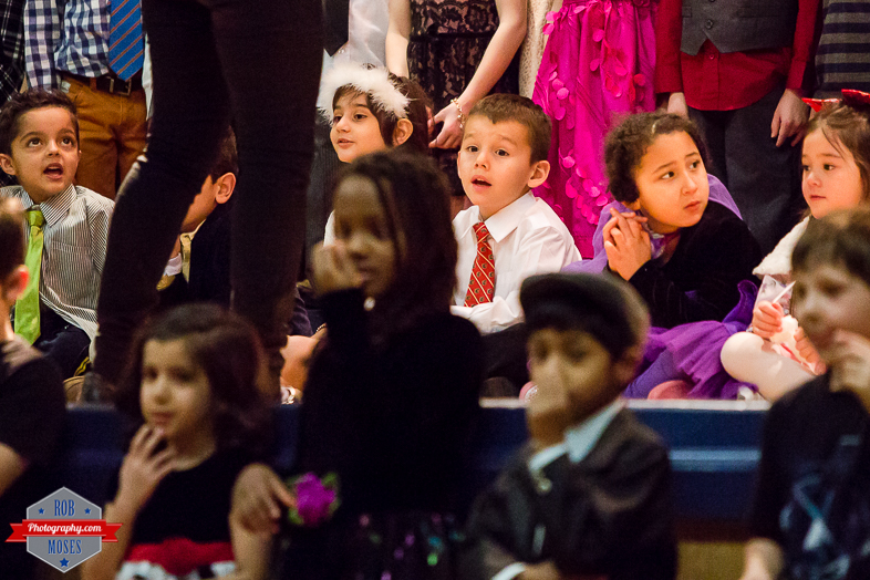 4 Child kid Christmas concert Flames tie cute - Rob Moses Photography - Calgary Photographer Photographers Native American Famous un celebrity Tlingit Ojibawa Top Popular Best Good Canadian