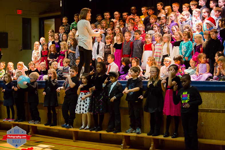 5 Child kid Christmas concert Flames tie cute - Rob Moses Photography - Calgary Photographer Photographers Native American Famous un celebrity Tlingit Ojibawa Top Popular Best Good Canadian