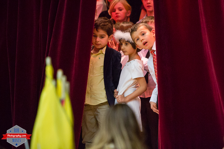 6 Child kid Christmas concert Flames tie cute - Rob Moses Photography - Calgary Photographer Photographers Native American Famous un celebrity Tlingit Ojibawa Top Popular Best Good Canadian
