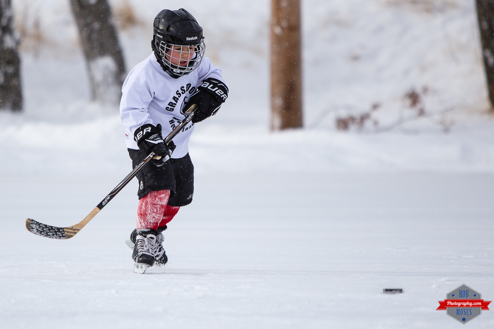 8 Boy child kid grassroots hockey outdoor action sports Rob Moses Photography Calgary Photographer Photographers Native American Famous un celebrity Tlingit Ojibawa Top Popular Best Good Canadian YYC